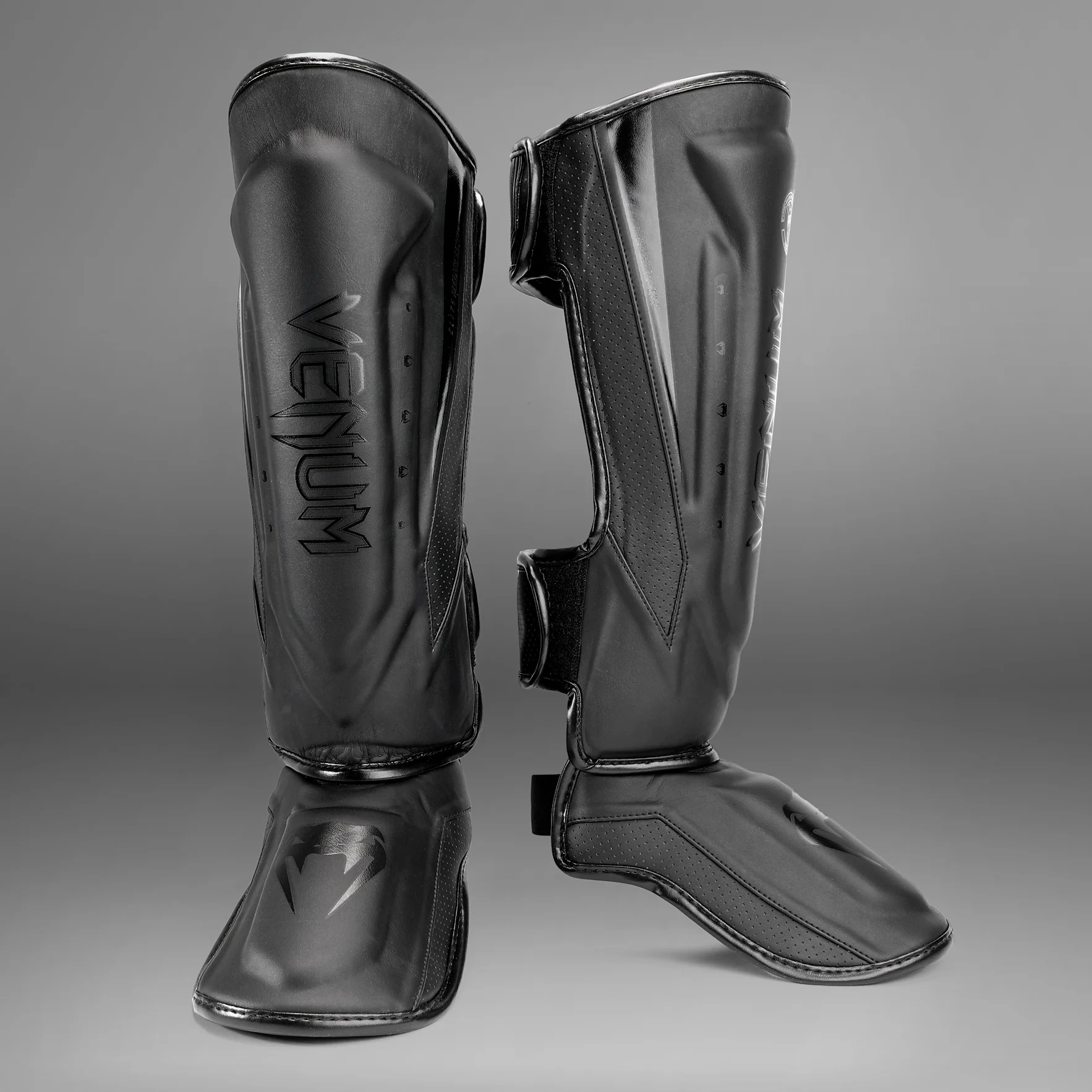 Espinilleras Venum Elite Evo - Negro/Negro