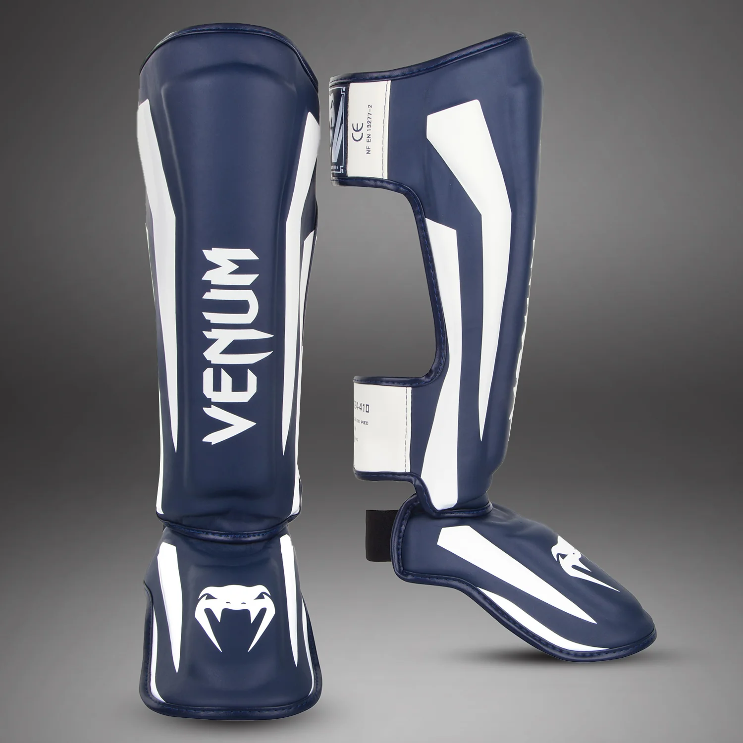 Espinilleras Venum Elite Standup - Blanco/Azul Marino