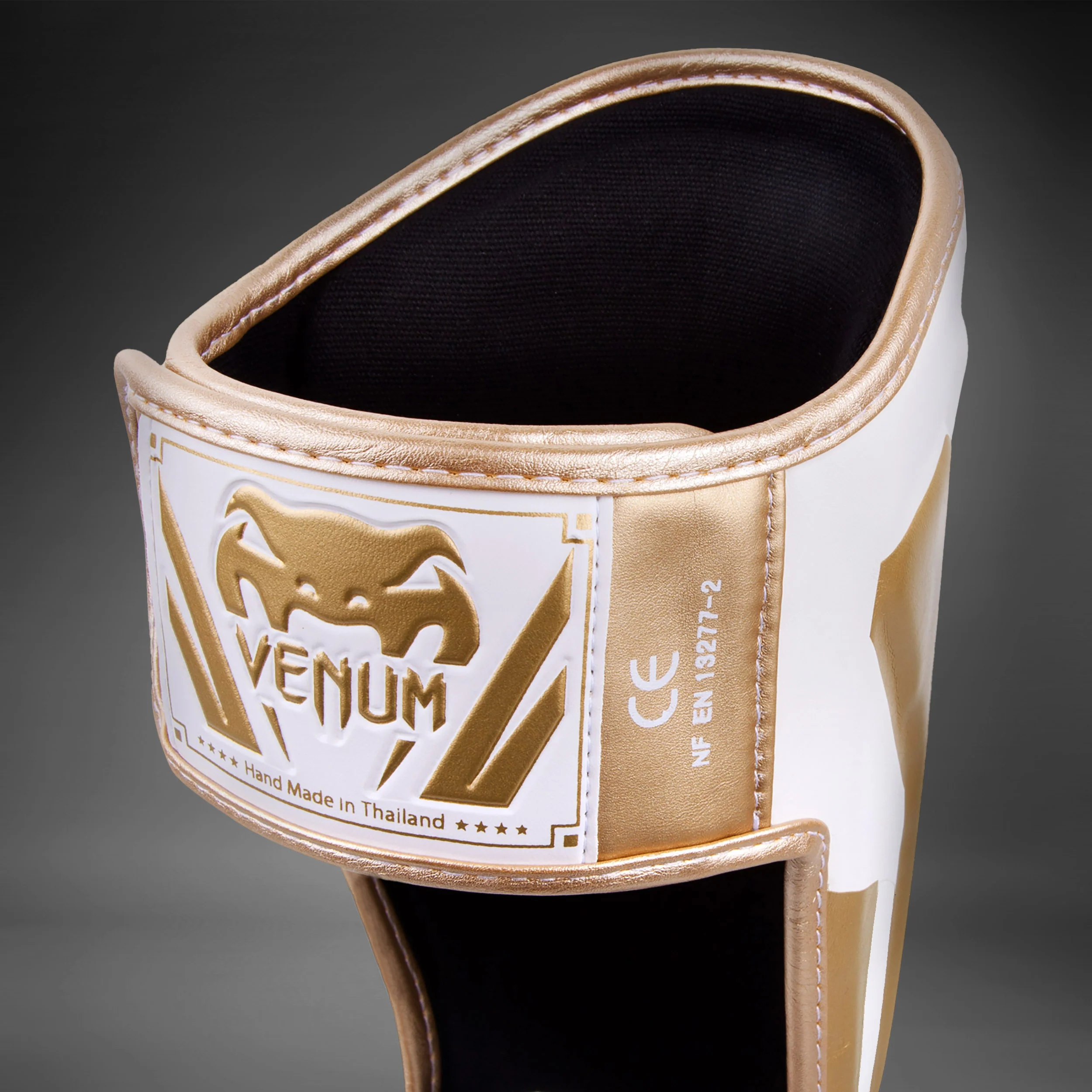 Espinilleras Venum Elite Standup - Blanco/Oro - Image 2