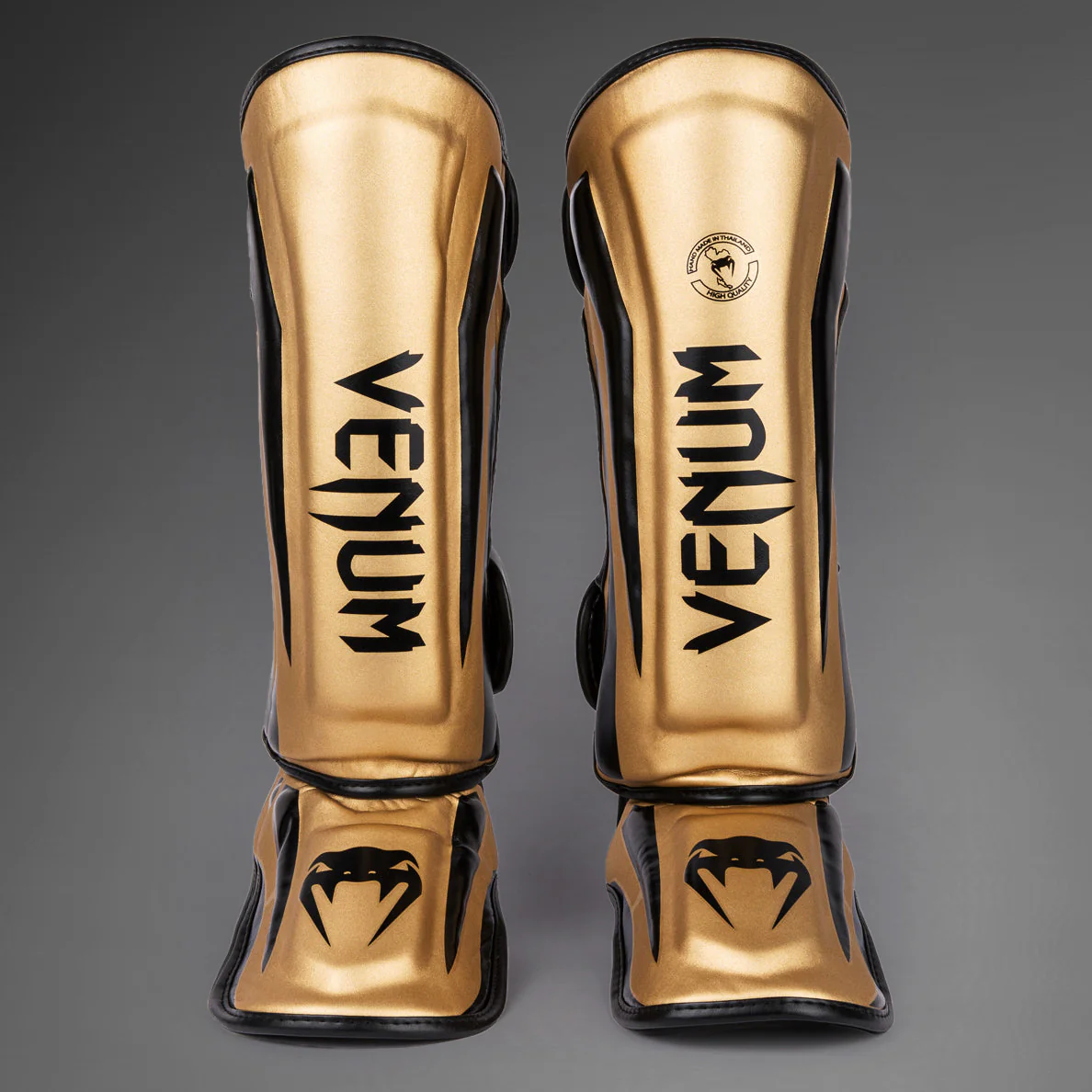Venum Elite Espinilleras Standup - Oro/Negro - Image 2