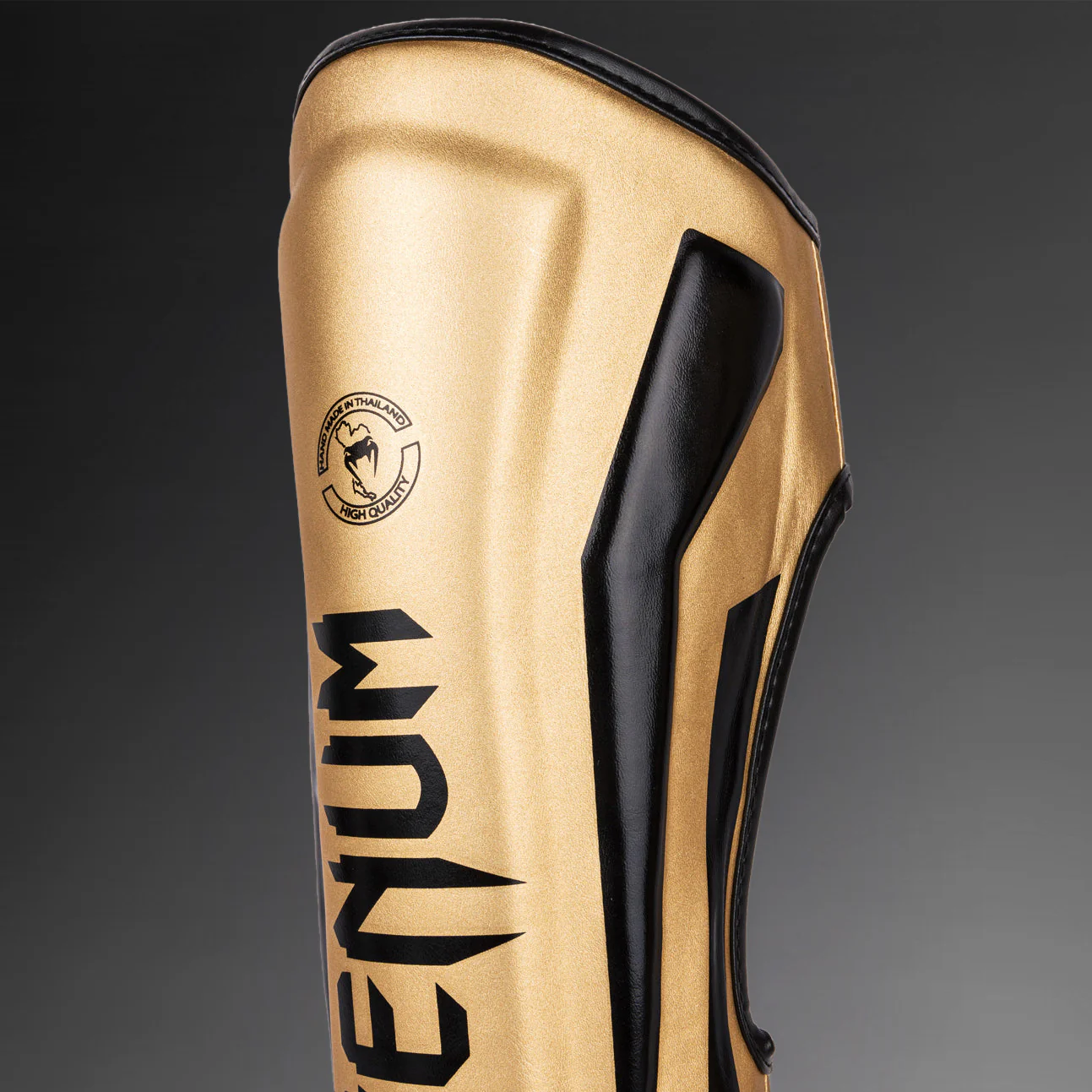 Venum Elite Espinilleras Standup - Oro/Negro - Image 3