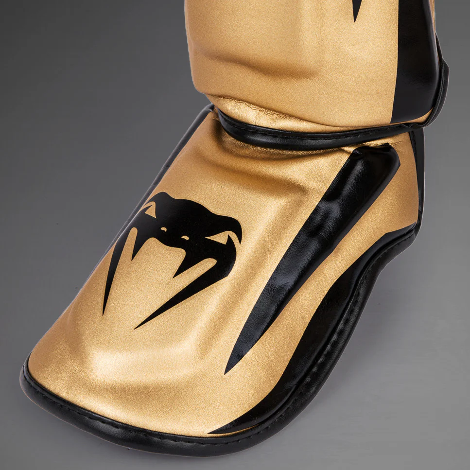Venum Elite Espinilleras Standup - Oro/Negro - Image 4